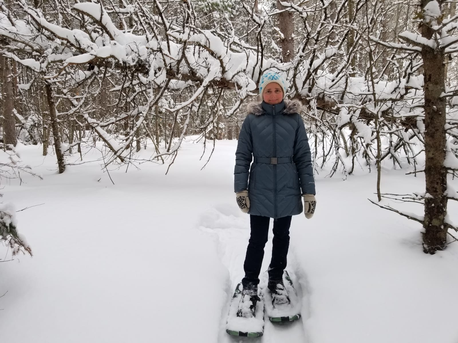 Elena on the mountain trail in snow shoes