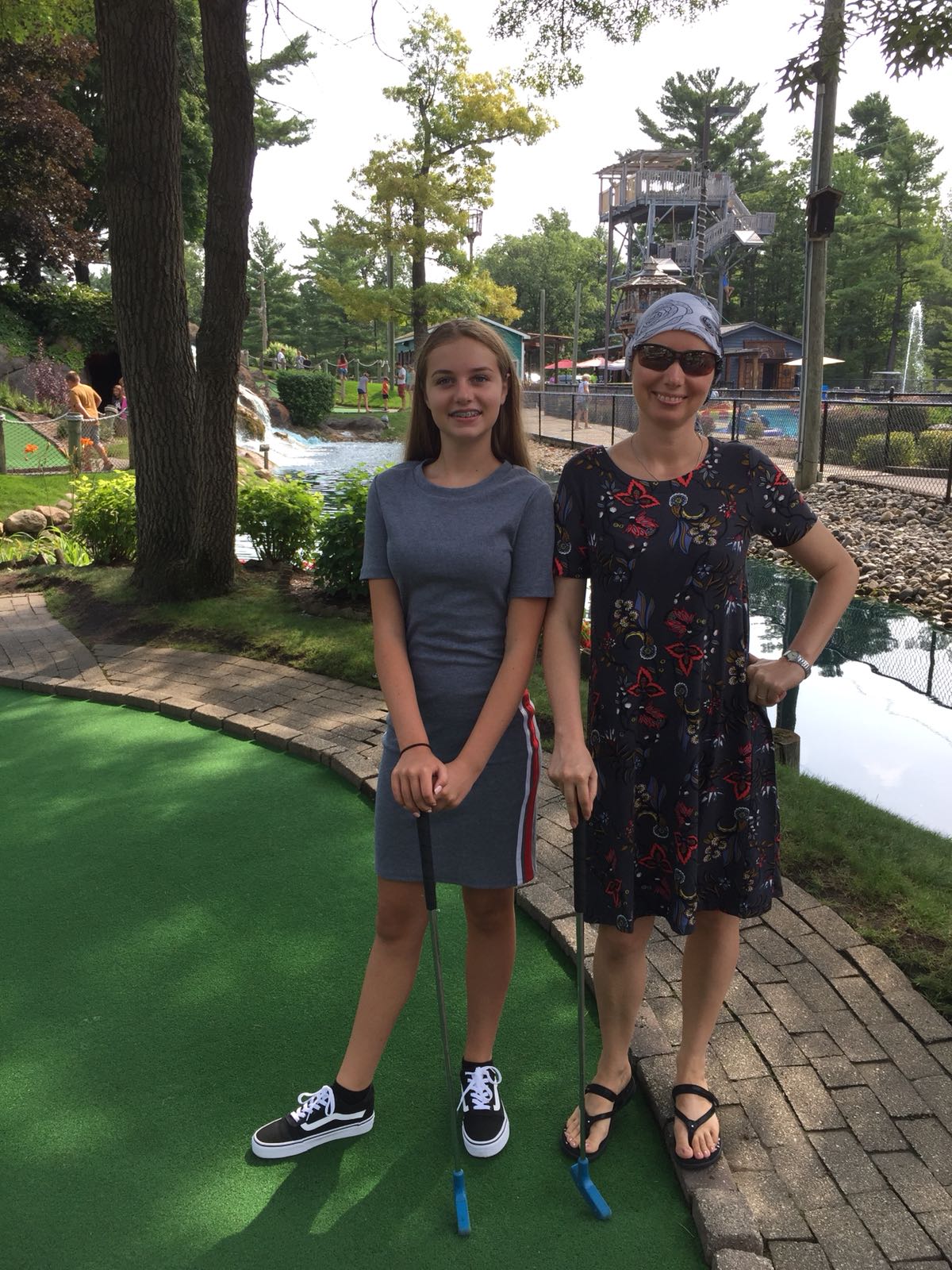 Elena and her daughter at the putting green