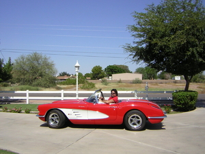 Kim Madsen with Red Corvette