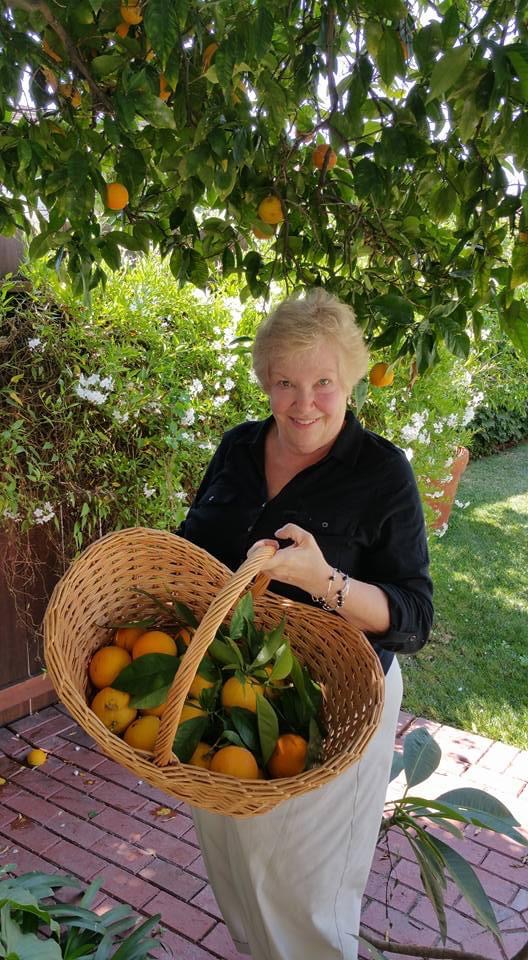 Liza with basket of oranges