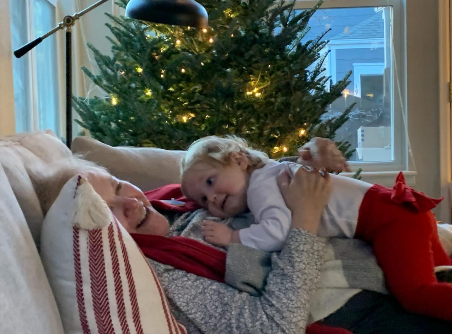 Liza with granddaugher on sofa
