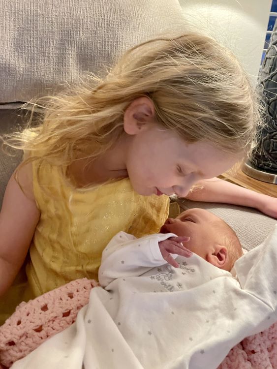 photo of granddaughter Anna and new sister Claire Elizabeth